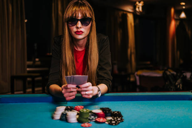 Live baccarat table with dealer and betting zones
